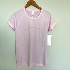 Nwt Lululemon Swiftly Tech Short Sleeve 2.0 Meadowsweet Pink/Meadowsweet Pink Size 10 Pink Lululemon Swiftly Tech, Lululemon Shirts Aesthetic, Pink Lululemon Shirt, Lulu Tops, Anna Claire, Lululemon Shirts, Lululemon Swiftly Tech Short Sleeve, Lululemon Shirt, Pink Lululemon