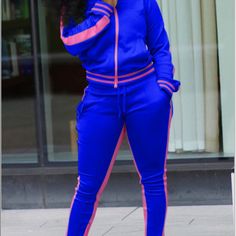 Nice Vibrant Blue With Pink Sides. Comfy, Great Material And Stretch. True To Size. Good Side Pockets And Reverse Zipper. Also Zips On Legs. Stylish And Can Be Dressed Up With Some Cute Heels Or Down With Your Favorite Pair Of Sneakers. Catch This Look Ladies! Blue Fitted Long Sleeve Tracksuit, Fitted Blue Tracksuit With Pockets, Blue Fitted Tracksuit With Pockets, Blue Stretch Sets With Pockets, Blue Tracksuit With Pockets And Long Sleeves, Sporty Blue Jumpsuits And Rompers For Spring, Fitted Blue Tracksuit For Loungewear, Casual Blue Stretch Jumpsuits And Rompers, Blue Stretch Casual Jumpsuits And Rompers