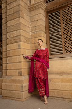 DETAILS Short, round hemmed shirt in silk charmeuse. Contrast hand-embellished kamdani collar, with back necktie. Gathered sleeves with a contrast cuff, hand-embellished with kamdani. Wide, matching shalwar, finished with gota work. Cotton net, contrasting dupatta, hand-embroidered with kamdani and finished with crochet lace edge. COLOR Red / Green / Cream / Shocking Pink SIZE Custom Order - A measurement guide will be sent upon order. Model is 5'7 MATERIAL Shirt - Silk CharmeuseTrousers - Silk Short Shirt With Shalwar, Red Silk Long Sleeve Kurta, Pakistani Fancy Dresses, Crochet Lace Edging, Gathered Sleeves, Green Cream, Silk Charmeuse, Lace Edging, Raw Silk