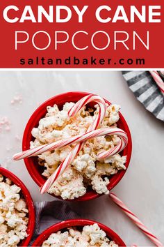 three red bowls filled with candy cane popcorn on top of a white tablecloth and text overlay that reads, candy cane popcorn