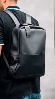 This customisable backpack is the epitome of minimalist elegance. Crafted from high-quality leather, it exudes sophistication and refinement. The backpack features a sleek design that's perfect for those who prefer a more understated look. 🔷The main compartment is spacious enough to fit a laptop of up to 15 inches. 🔷In addition to the laptop compartment, the backpack features a front pocket that's perfect for storing smaller items like your phone, keys, or wallet.  The backpack also comes with Modern Travel Backpack With Smooth Grain, Modern Smooth Grain Leather Rectangular Backpack, Modern Backpack With Leather Lining For Everyday, Modern Leather Backpack With Smooth Grain, Rectangular Smooth Grain Backpack For Travel, Luxury Soft Leather Everyday Backpack, Luxury Leather Standard Backpack, Modern Business Backpack With Leather Backing, Luxury Leather Backpack With Smooth Grain