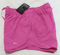 New Nike Women's running Dry Tempo Shorts 831558-662 medium size  Get images that make Supersized seem small. THE simple solution for eBay sellers. Track Page Views With Auctiva's FREE Counter Nike Stretch Athletic Shorts For Jogging, Pink Casual Shorts For Running Errands, Pink Casual Athletic Shorts, Nike Stretch Shorts For Running Errands, Nike Stretch Shorts For Casual Wear, Casual Pink Bottoms For Running Errands, Pink Athletic Shorts For Jogging, Pink Sportswear Shorts For Jogging, Pink Short Activewear For Jogging