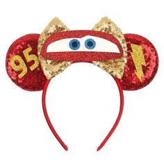 a red mickey mouse ears headband with lightning bolt on the front and number 10 on the back