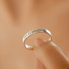 A meaningful gift for your friend, sister, mother, friend, bridesmaid, loved one or a special treat just for yourself. This affordable and thoughtful gift will surely be treasured by your loved one.This customized name ring can be engraved however you desire. Type your roman numeral, names, initials, your special date or inspirational words to design your necklace, make you unique and show off your personality.• Completely handmade items.• Various ring materials; from sterling silver to rose gol Simple Engraved Ring For Anniversary, Simple Initial Ring As Gift, White Gold Engraved Name Ring For Gift, White Gold Engraved Name Ring As Gift, Minimalist Customizable Initial Ring For Promise, Personalized Stackable Promise Rings For Mother's Day, Engraved Name White Gold Ring For Gift, Minimalist Engraved Ring For Promise, Classic Jewelry With Custom Text For Anniversary