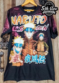 #naruto #ninja #konoha #ninetails #manga #anime #tee #mangatee #animetee #tshirt #shopvintage #thrift #thriftshop #90sstyle #vintageclothing #vintaget #bootleg Casual T-shirt With Screen Print For Fan Gatherings, Fandom Graphic Print T-shirt For Streetwear, 90s Anime Print Crew Neck T-shirt, Pop Culture Anime Print T-shirt For Fan Gatherings, Black Casual Sublimation T-shirt With Character Print, Casual Black Sublimation T-shirt With Character Print, Casual Screen Print T-shirt For Fan Events, Band Merch Crew Neck T-shirt For Fan Gatherings, Pop Culture T-shirt With Screen Print For Cosplay