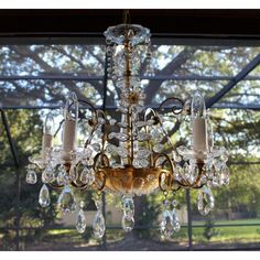 A rare and fantastic French Art Deco Maison Bagues Brass/ Bronze & Cut Crystal Chandelier. Cut crystal floral petals, flowers and basket. Illuminated from the basin [3 lights in bottom basin]  and 5 outside lights. Stunning and in fine condition. Height without chain 27 inches and with beautiful original detailed chain 65 inches. French Country Patio, Country Patio, Outside Lights, Flower Chandelier, Petal Flower, French Art Deco, French Art, Crystal Chandelier, French Country