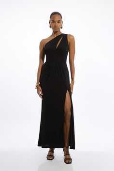 Feel Formal In Our Maxi Dress, Which Features A Draped, Ruched Design And A Fit That Skims The Curves. The One Shoulder Design Makes For A Uniquely Elevated Party Piece, And The Straight Hanging Skirt With The Leg Split Makes For An Ethereal Look. Style It With Court Heels Or Strappy Stilettos For A Look Ideal For Anything From Wedding Guest Days To Dinner Dates. Premium Viscose Jersey One Shoulder Split Maxi Dress High Quality, Stretchy Jersey Fabric Flattering, Fitted Bodice  Draped Waist Desi Bride Jumpsuit, Petite Wedding Guest Dresses, Latest Maxi Dresses, Plus Size Workwear, Summer Bridesmaid Dresses, Maxi Dress Collection, Dinner Dates, Leg Split, Court Heels