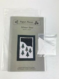 paper pieces for quilting with white trees