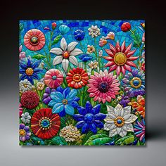 a painting with flowers painted on it in blue and red colors, against a gray background