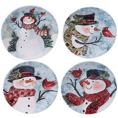 four snowmen with hats and scarfs on plates