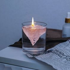 a candle that is sitting on top of a table