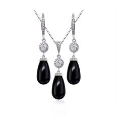 "Swarovski Mystic Black Jet Black Necklace and Earrings Jewelry Set A beautiful jewelry set perfect for the bride, mother of the bride, mother of the groom, bridesmaids, maid of honor, matron of honor or wedding guests for a black themed wedding.  Also a perfect gift or accessory for prom, birthday or anniversary parties. EARRINGS AND NECKLACE CAN BE PURCHASED SEPARATELY OR AS A SET. Materials: 15mm x 8mm Swarovski Long Drop Pearls.   Rhodium Plated Sterling Silver Necklace Chain Rhodium Plated Black Prom Jewelry, Black Themed Wedding, Black Wedding Jewelry, Prom Birthday, Black Jet, Wedding Jewelry Set, Bridal Jewelry Set, Prom Jewelry, Black Prom