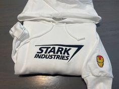 a white hoodie with the words stark industries on it