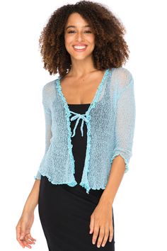 The cardigan to love for the frill of it! This gossamer mesh-like aqua knit cover up is as feminine as it is fun - a beautiful lightweight layer that dresses up casual looks or adds just a touch of coverage over revealing summer styles. Super-stretchy viscose creates a comfortable fit and never wrinkles, scrunching easily into your purse or carryon for travel or vacation. Naturally ruffled sleeves complement a full ruffle front that you can tie closed with the attached string or leave open in a pretty cascade. Back From Bali is dedicated to creating beautiful, quality clothing with a heart. All of our items are crafted, sewn and painted by hand in Bali, by local artists and women who own small home businesses. For over 20 years, we have nurtured fair, honest and caring relationships with o Shrug For Women, Sweater Shrug, Dress Cardigan, Bolero Cardigan, Sheer Sweater, Bolero Shrug, Low Cut Dresses, Loungewear Dresses, Shrug Cardigan