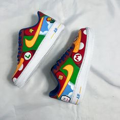 Discover the magic of childhood with our exclusive hand-painted zapatillas from Mario Bros. Each is a unique work of art, where the iconic characters of the famous video game come to life in a vibrant and colorful design. Perfect for summer fans, they are ideal for any occasion, be it a casual day in the city or a reunion with friends. Don't miss the opportunity to follow a piece of the history of gaming. Furthermore, we offer you the possibility of personalizing them with another theme, which a Art Unique, Colorful Design, Iconic Characters, Mario Bros, Air Force 1, The History, Video Game, Air Force, The Magic