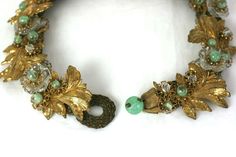 For Sale on 1stDibs - Early Miriam Haskell 1930s Gilt and Venetian Glass Collar, of signature Russian Gilt baroque leaves and flowerheads, hand made crystal flowers, and green Elegant Vintage Collection Jewelry, Vintage Glass Jewelry For Weddings, Vintage Gold Jewelry With Bead Caps, Vintage Green Decorative Jewelry, Vintage Bead Caps Jewelry For Party, Vintage Green Jewelry For Vintage Events, Vintage Party Jewelry With Bead Caps, Green Vintage Jewelry For Vintage Events, Elegant Green Jewelry With Vintage Charm