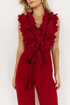 Get an ultra chic must-have! Our Tyra Ruffle Tank Jumpsuit comes in a burgundy color and is perfect for any occasion! Elegant V-neck Ruffled Jumpsuits And Rompers, Elegant Ruffled Jumpsuits And Rompers For Date Night, V-neck Ruffled Jumpsuit For Date Night, Ruffled V-neck Jumpsuit For Date Night, Red Chic Jumpsuits And Rompers With Ruffles, Chic Red Jumpsuit With Ruffles, Burgundy Jumpsuit, Tank Jumpsuit, Baltic Born