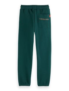 Made from 100% cotton, these sweatpants redefine leisurewear with a trend-forward touch, suitable for laid-back weekends or making a casual statement around town. 100% Cotton Wash - 30 Degrees Normal Fall Casual Sweatpants With Straight Hem, Casual Sweatpants With Straight Hem For Fall, Fall Cotton Sweatpants With Straight Hem, Cotton Sweatpants With Straight Hem For Fall, Green Cotton Sweatpants For Fall, Trendy Green Cotton Sweatpants, Casual Green Joggers For Fall, Green Relaxed Fit Joggers For Fall, Trendy Cotton Sweatpants With Elastic Waistband