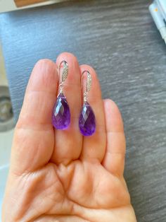 Luxury natural Amethyst dangle drops Pave Earrings. Sterling Silver jewelry. February birthday. Ultra violet gemstone. Handmade, luxury pair of earrings comprised of stunning Purple Amethyst briolette gem stones hand wire wrapped to sterling silver Pave ear wires studded with tiny, sparkling, diamond like CZ in front. Great gift for her, they will be a family heirloom for years to come. Gorgeous, high quality genuine stone is opaque with small natural inclusions measuring 21 x 9.5 mm, both are a Formal Briolette Earrings With Gemstone Accents, Purple Oval Earrings With Gemstone Accents, Elegant Drop Gemstone, Elegant Purple Teardrop Gemstone, Oval Amethyst Earrings With Gemstone Accents, Purple Briolette Fine Jewelry Earrings, Elegant Purple Briolette Earrings, Fine Jewelry Amethyst Dangle Earrings, Amethyst Dangle Earrings Fine Jewelry