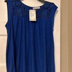 Royal Blue, Sleeveless Loose Fitting Top Never Worn With Tags. Blue Sleeveless Tank Top For Beach, Blue Sleeveless Tank Top For The Beach, Blue Stretch Sleeveless Tops, Blue Sleeveless Vest Top, Casual Sleeveless Blue Blouse, Blue Sleeveless Tank Top, Blue Sleeveless Camisole For Summer, Blue Tank Vest Blouse, Blue Sleeveless Blouse Camisole For Summer