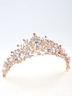 <p>Like Aurora's gown in "Sleeping Beauty," this tiara features touches of pink. </p> Photo - These Disney-inspired tiaras are for princesses of all ages | Revelist Crystal Crown Tiaras, Inexpensive Jewelry, Princess Inspired, Magical Jewelry, Crystal Crown