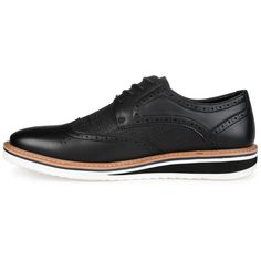 A dress shoe that combines high-style with all-day comfort, the Warrick by Vance Co. A wingtip accent and a contrasting textured design enhanced with brogue details tops this lace-up derby. Smooth vegan leather, a lightweight EVA outsole, and a 4 mm memory foam footbed provide superior support. Black Semi-formal Dress Shoes For Fall, Black Oxfords With Contrast Sole For Spring, Black Dress Shoes With Perforated Toe Box For Work, Black Dress Shoes With Perforated Toe For Work, Wingtip Dress Shoes With Perforations For Workwear, Casual Dress Shoes With Perforated Toe For Workwear, Casual Black Dress Shoes With Brogue Detailing, Black Oxfords With Contrast Sole For Work, Casual Fitted Dress Shoes With Brogue Detailing