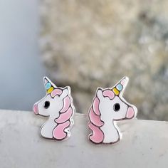 925 Sterling Silver Tiny Unicorn Stud Earrings Metal:925 Sterling Silver Hallmark:925 Width:9 mm Height:11 mm >Nickel Free >Pure Silver >Tarnish Resistant >No Allergic reaction >30 days return policy ++Items come in a gift box ready to be gifted Please contact me if you have any questions about the jewelry you are interested in buying. My Shop: https://www.etsy.com/shop/banujewelryusa Follow BANU Jewelry on Facebook, Instagram and other social media sites to keep up to date with n Pink Sterling Silver Earrings For Birthday, Silver Hypoallergenic Kawaii Earrings, Hypoallergenic Silver Kawaii Earrings, White Sterling Silver Earrings For Birthday, Handmade Silver Kawaii Earrings, Handmade Kawaii Silver Earrings, White Unicorn Print Jewelry For Gifts, White Unicorn Print Jewelry For Gift, Playful Sterling Silver Jewelry