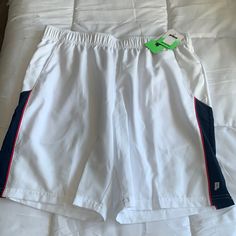 Prince Mens Tennis Colorblock Athletic 9” Shorts - Never Worn Before With Tags - 9” Inseam - Xl Size - White With Blue And Red Side Colorbloxk - Wicking Performance Property White Moisture-wicking Tennis Bottoms, White Tennis Shorts Athleisure, White Shorts For Tennis Athleisure, White Athleisure Tennis Shorts, White Sportswear Tennis Bottoms, White Tennis Sportswear Bottoms, Sporty White Tennis Shorts, Sporty White Color Block Bottoms, White Color Block Sports Bottoms