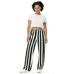 Fun black and white stripes make these the coolest casual lounge pants. Pajamas for bedtime or just comfy wide-leg pants for kicking back around the house. Versatile black stripes make these great pants for your pirate costume. PJLove pants feature a relaxed unisex fit and can be worn comfortably on the waist or the hips. Elastic waistband with white drawstring for ultimate sizing versatility. With practical side pockets, our pjs/lounge pants are made of premium knit mid-weight (6.19 oz/yd2) jer Casual Black Pants For Pajama Party, Casual Black Sleep Pants, Black Casual Sleep Pants, Casual Wide Leg Pants For Pajama Party, Casual Black Bottoms For Pajama Party, Black Bottoms For Pajama Party In Spring, Casual Black Bottoms With Vertical Stripes, Black Pants For Summer Pajama Party, Striped Relaxed Fit Bottoms For Pajama Party