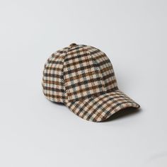 Grab this classic shaped baseball hat in a trendy ivory multi plaid fabric to stay stylish and chic everyday this fall. Shop Black/Grey Material: 100% Polyester Measurements: 13 ¼” x 13”, Brim: 2 ¾”, Head Measurement is 57cm Weight: 3oz Dry Clean Fall Baseball, Fall Cap, Boy Accessories, Scarf Hat, Plaid Fabric, Buy Buy Baby, Mini Boden, Baseball Hat, Shoes Booties