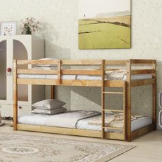 a wooden bunk bed sitting on top of a carpeted floor next to a white dresser