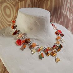 Autumn vibes of falling leaves, aromatic spices and pumpkins are what inspired me to create this necklace! Fall is my favorite season, so I love working in this color scheme. Make a gift for yourself or a loved one, you will be happy to wear such a necklace🤭 Such wonderful jewelry will perfectly complement any outfit. I hope you liked my work, if you want to make changes or order a custom design, please contact me, I will be happy to make your wishes come true 🙏 Necklace length: 37 cm + chain 5 cm (can be changed to your size) Materials: glass beads, acrylic beads, wooden beads, stainless steel fittings. Jewelry care: Try not to get varnishes, perfumes, deodorants, soaps and other cosmetics, as well as seawater and pool water on the jewelry. You should not wear jewelry during sports and Necklace Grunge, Orange Leaves, Stainless Steel Fittings, Orange Leaf, Falling Leaves, Fall Gifts, Autumn Vibes, Favorite Season, Halloween Jewelry