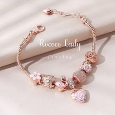 "To available amazing discounts and coupons click on our store! https://www.etsy.com/shop/RococoLadyJewelry?ref=simple-shop-header-name&listing_id=1044529597 Handmade Crystal Heart Charm Bracelet Personalized jewelry rose quartz bracelet, Snake chain rose gold bracelet Valentines day gifts for her ♥ Description ♥ ✨ This stunning Crystal charm bracelet is a complete and wonderful personalized love bracelet, it looks extremely gorgeous specially in the natural light. Use warm tones to warm the hea Bracelet Valentines, Pandora Bracelet Designs, Troll Beads, Custom Charm Bracelet, Rose Quartz Bracelet, Pandora Charm, Valentines Day Gifts For Her, Rose Gold Bracelet, Pandora Bracelets