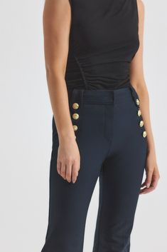 Our cult-favorite flared twill trouser with gold-tone sailor button details along the hips. Zip fly with button closure, flat front, tonal belt loops and stitching. The Robertson is made in our best-selling Crosby Twill stretch cotton. The comfortable 2-way stretch cotton twill is wrinkle resistant and lends itself to good stretch and recovery. High Waist Bottoms With Side Buttons, Elegant Fitted Bottoms With Gold Buttons, Formal Fitted Bottoms With Gold Buttons, Fitted Bottoms With Side Buttons For Work, Chic Workwear Bottoms With Side Buttons, Chic Formal Bottoms With Gold Buttons, Fitted Bottoms With Gold Buttons For Work, Chic Workwear Bottoms With Gold Buttons, Navy Mid-rise Casual Bottoms