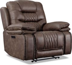 the reclining chair is brown leather with studding