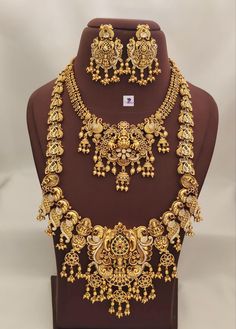 Exclusive bridal collection  Best quality Matt gold finish hand made  necklace, long haram,  suitable for weddings and occasions! Party and wedding wear Anteque gold  finish one gram gold bridal set with precious workmanship handmade jewellery with awesome workmanship and beautiful finishing just like temple jewellery for you open video must if any damages to report Gold Sets With Pallu For Marriage, 22k Yellow Gold Temple Necklace For Wedding, Gold Festive Sets For Marriage, Wedding 22k Yellow Gold Temple Necklace, 22k Gold Meenakari Bridal Necklace For Wedding, Ceremonial Gold Jewelry With Zari Work, Traditional Gold Necklace For Marriage, Gold-plated Jewelry With Zari Work, Gold Plated Jewelry With Zari Work