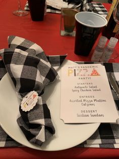 a table set with place settings, napkins and utensils for an event