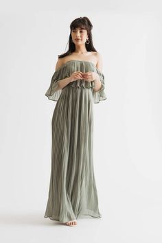 "You'Re A Free Spirit-And The Free Spirited Pleated Off Shoulder Tube Maxi Dress In Dusty Sage Was Made For You. With A Beautiful Pleated Skirt And An Off-The-Shoulder Silhouette, This Maxi Dress Billows And Flows As You Move. The Perfect Pick For A Summer Day Or A Warm Evening, This Dress Will Make You Feel Like The Beautiful Goddess You Are. Whether You'Re Strolling Through A Sun-Drenched Field Or Dancing The Night Away, You'Ll Be Sure To Turn Heads In This Stunning Dress." Moh Dress, Garden Outfit, Closet Necessities, Long Sleeve Flowy Dress, Tube Maxi Dress, Off The Shoulder Maxi Dress, Tube Maxi Dresses, Sage Dress, Dusty Sage