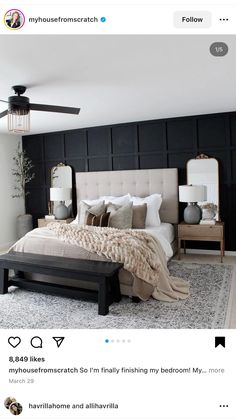 a bedroom with black walls and white bedding is featured in the instagram post