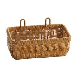 a wicker basket with handles and handles on the bottom, in front of a white background