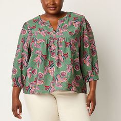 Refresh your look with this printed St. John's Bay women's plus blouse made from soft woven fabric. It's cut for a regular-fit and features a split crew neck and three-quarter sleeves with button cuffs. Style it with a skirt or pull-on pants and heeled sandals. Fit: Regular FitNeckline: Split Crew NeckSleeve Length: 3/4 SleeveApparel Length: 28 InchesFiber Content: 86% Rayon, 14% NylonFabric Description: Plain WeaveCare: Tumble Dry, Machine WashCountry of Origin: Imported Green Blouse, Pull On Pants, Shop Blouses, Heeled Sandals, Three Quarter Sleeves, Three Quarter, Woven Fabric, Blouses For Women, Shirts Tops