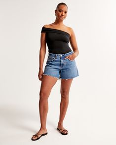 Embrace the casual flair of the Abercrombie & Fitch Women's Curve Love Low Rise Baggy Shorts, designed to flatter and provide comfort. These shorts are a perfect blend of style and practicality, featuring a low rise and a baggy, relaxed fit through the leg, while remaining fitted at the waist. The unique Curve Love design includes an extra 2 inches through the hip and thigh, effectively eliminating waist-gap for a smoother silhouette.

- Size: 36
- Color: Medium Indigo Wash
- Material: Pocket Ba Chic Relaxed Fit Straight Leg Shorts, Relaxed Fit Cutoff Bottoms For Day Out, Casual Relaxed Fit Cutoff Bottoms, Relaxed Fit Straight Leg Shorts For Day Out, Baggy Shorts Women, Baggy Denim Shorts, Baggy Shorts, Baggy Denim, Love Design