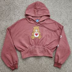 New With Tag. Care Bears Cropped Hoodie. Size X Large. Make A Offer Bundle More Stuff And Send A Offer Cute Hooded Fleece Tops, Cute Fleece Hoodie For Spring, Pink Hooded Top For Fall, Pink Cozy Crew Neck Hoodie, Cozy Pink Crew Neck Hoodie, Casual Pink Hooded Top, Cute Pink Hoodie Top, Cute Pink Hoodie For Streetwear, Cute Hooded Hoodie For Loungewear