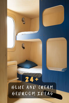 there is a blue and cream bedroom with bunk beds in the room that looks like an airplane