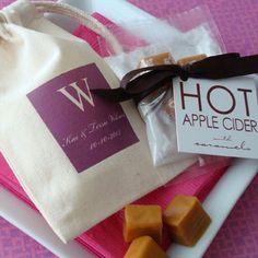 a bag and some pieces of food on a plate with a sign that says hot apple cider