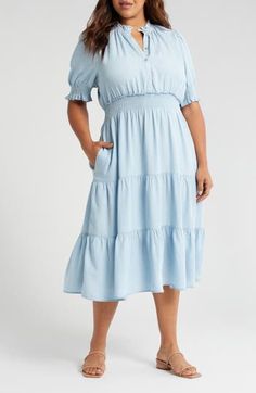 Crafted from soft, sustainable Tencel® lyocell, this ruffle-decked dress will be worn on repeat. 48 1/2" length (size 2X) Button half placket Band collar Short sleeves Side-seam pockets Elastic waist Unlined 100% Tencel® lyocell Tencel lyocell is a more-sustainably produced fiber made with closed-loop processing Machine wash, line dry Imported Spring Dresses With Ruffle Hem And Relaxed Fit, Relaxed Fit Ruffled Dresses For Daywear, Relaxed Fit Ruffle Dress For Daywear, Relaxed Fit Dress With Ruffle Hem For Daywear, Spring Midi Dress With Ruffles, Relaxed Fit, Casual Flowy Viscose Dress, Spring Midi Dress With Ruffles And Relaxed Fit, Spring Flowy Tiered Dress For Daywear, Flowy Tiered Skirt Dress For Daywear