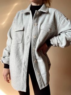 Elevate your fall wardrobe with our Light Grey Fleece Shacket. This midweight, warm shacket is the perfect blend of sophistication and comfort. Designed with button-up closure, pockets, double button cuffs and breast pockets, it can be your go-to for a touch of luxury whether you wear it as a shacket or a jacket. 100% polyester Brooke is 5'4" 120lb wearing the small. We recommend your true size. Fit is oversized. Grey Shacket Outfit, Grey Jacket Outfit, Fleece Shacket, Shacket Outfit, Jumpsuit Jacket, Fall Wardrobe, Gray Jacket, Summer Aesthetic, Sweater Jacket