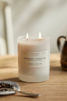 Fresh and citrusy, this gorgeous candle from Sydney Hale is scented with notes of the salty citrus of winter blooming bergamot orange blend and comes alive with the soothing aroma of dried black tea leaves. About Sydney Hale: Established in Northern Virginia in 2008, Sydney Hale now calls the Manchester neighborhood of Richmond, VA home. Their objective has always been to formulate beautiful products of the highest quality here in the USA, to reduce the stress on landfills through our choice of Anthropologie Candle, Bedroom Candles, Black Tea Leaves, Easy Candles, Candle Labels, Unique Candles, Candle Collection, Hand Poured Candle, Work Organization