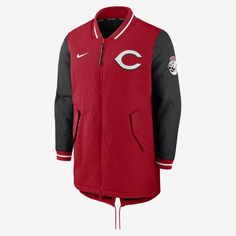 Featuring team graphics on the chest and sleeve, the Nike Dugout (MLB Cincinnati Reds) Jacket is built with an extended torso and an adjustable drawstring at the back. Its water-resistant twill fabric helps provide proper outdoor coverage in inclement conditions. Nike Functional Outerwear For Sports Events, Red Sports Event Outerwear With Baseball Collar, Red Baseball Collar Outerwear For Sports Events, Nike Outerwear For Sports Events, Urban Style Track Jacket With Baseball Collar For Sports, Sporty Outerwear With Team Logo For Sports, Urban Track Jacket With Baseball Collar For Sports, Sporty Team Logo Outerwear For Sports, Nike Winter Outerwear For College