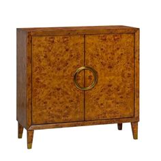 an old wooden cabinet with a gold ring on the front and bottom door, isolated against a white background